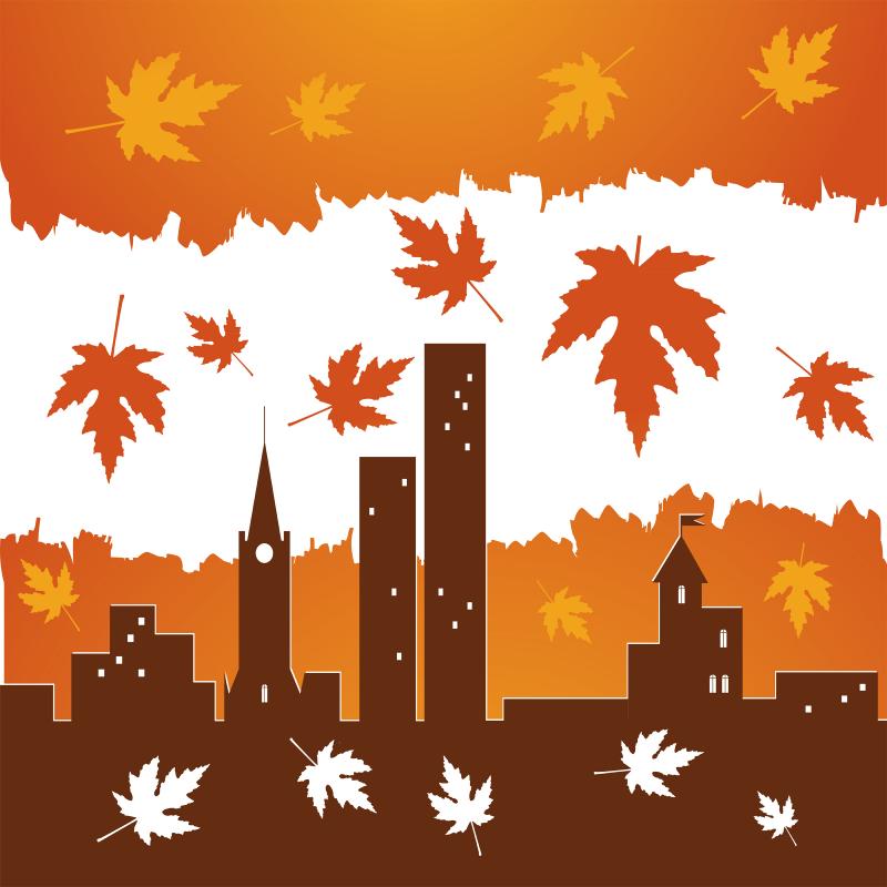 clipart illustration of a city skyline with maple leaves falling from the sky 